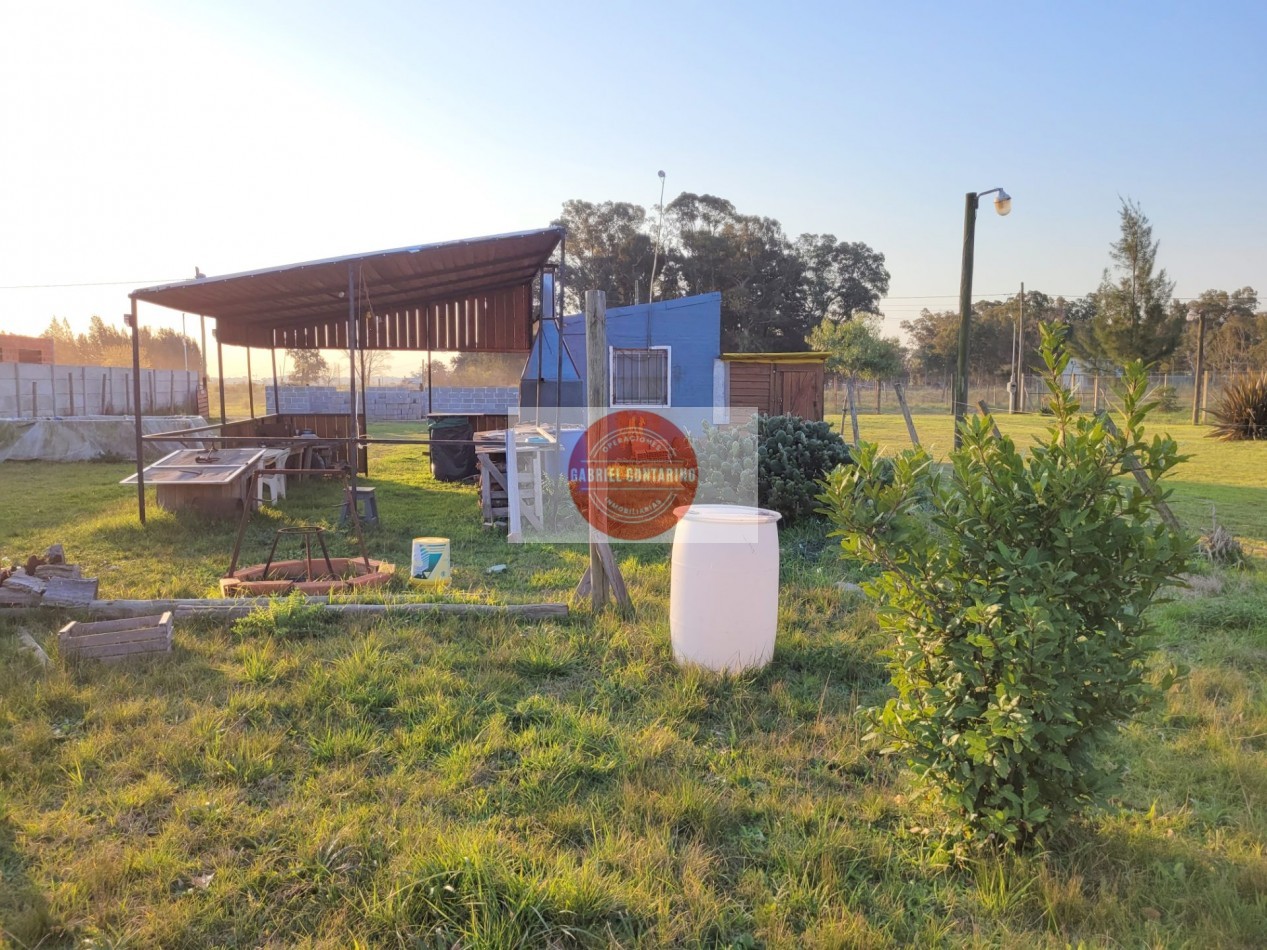 TERRENO CON MONOAMBIENTE, QUINCHO Y PISCINA