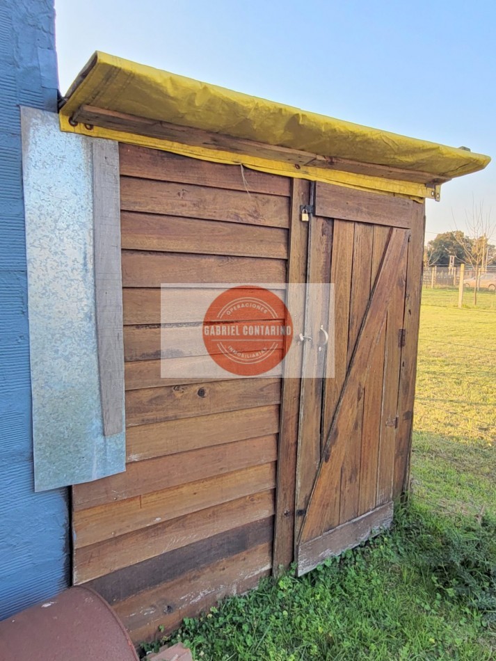TERRENO CON MONOAMBIENTE, QUINCHO Y PISCINA