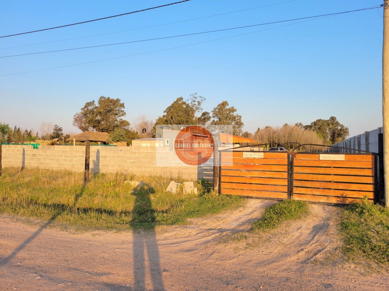 TERRENO CON MONOAMBIENTE, QUINCHO Y PISCINA