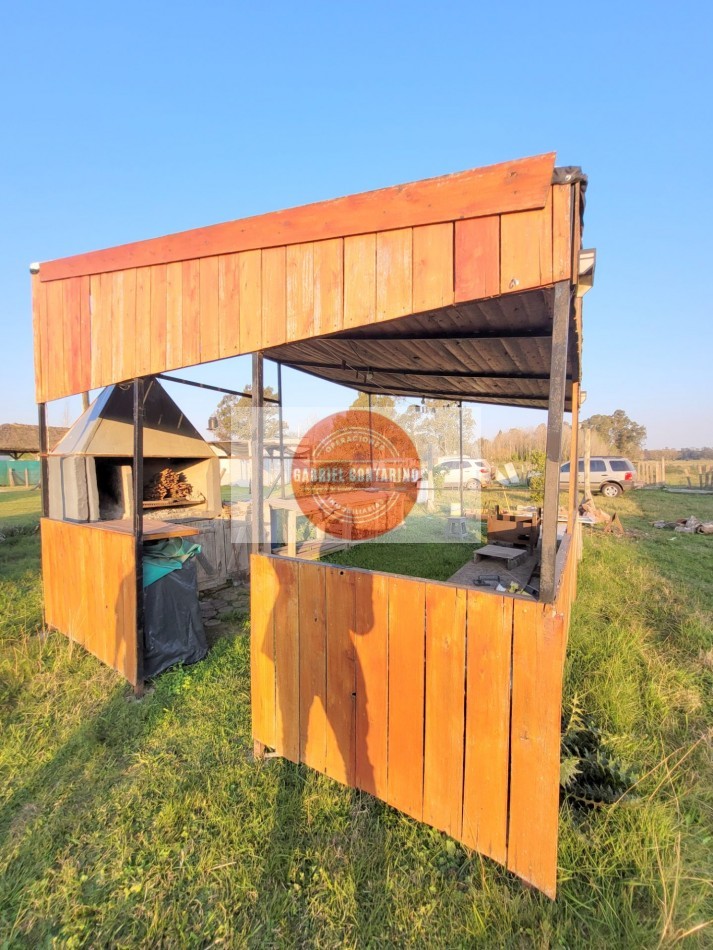 TERRENO CON MONOAMBIENTE, QUINCHO Y PISCINA