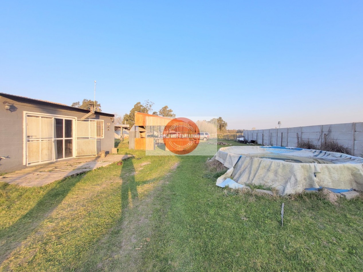 TERRENO CON MONOAMBIENTE, QUINCHO Y PISCINA