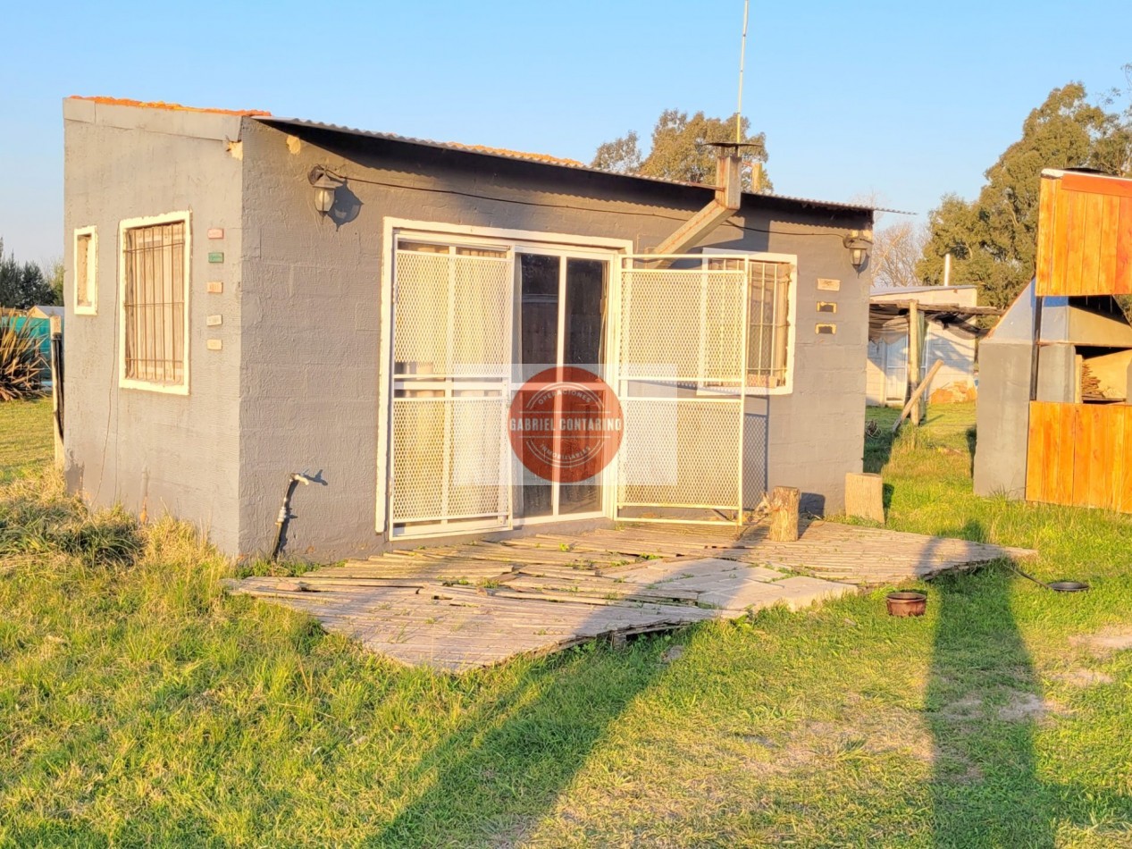 TERRENO CON MONOAMBIENTE, QUINCHO Y PISCINA