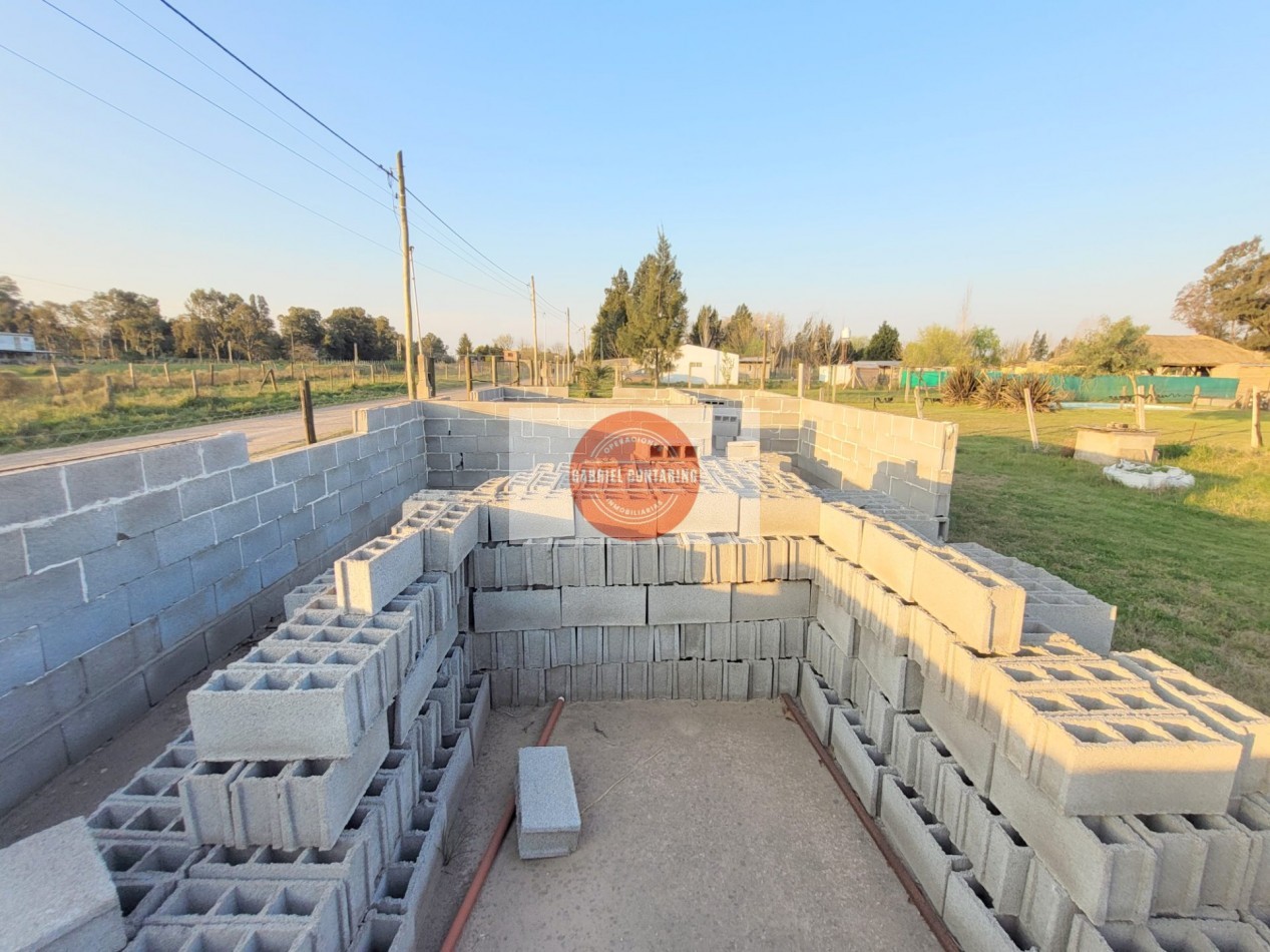 TERRENO CON MONOAMBIENTE, QUINCHO Y PISCINA
